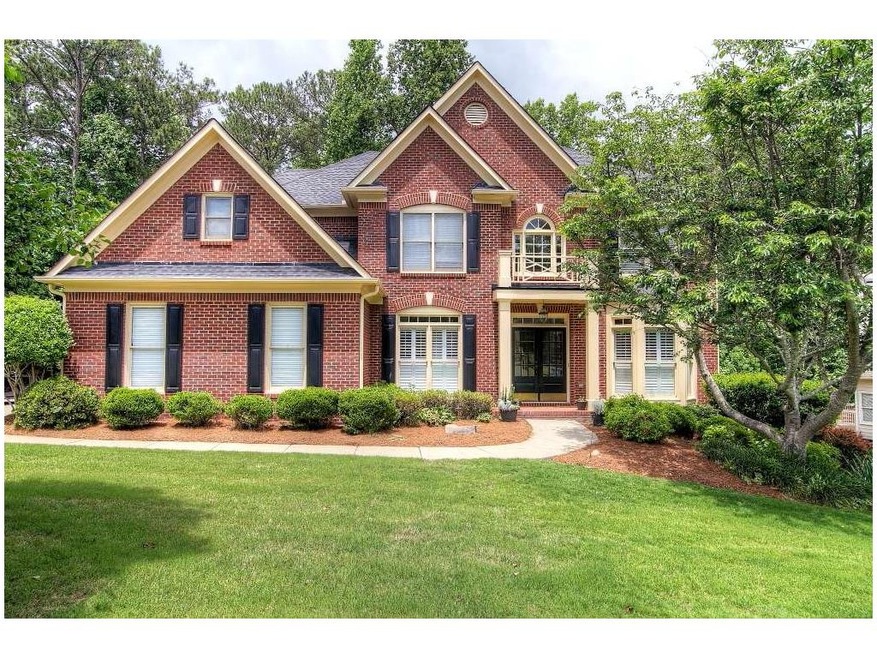 3 sides brick, side entry kitchen level garage,