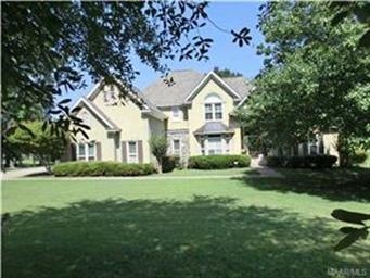 This stunning 4 bedroom, 3.5 bath Wynlakes home is