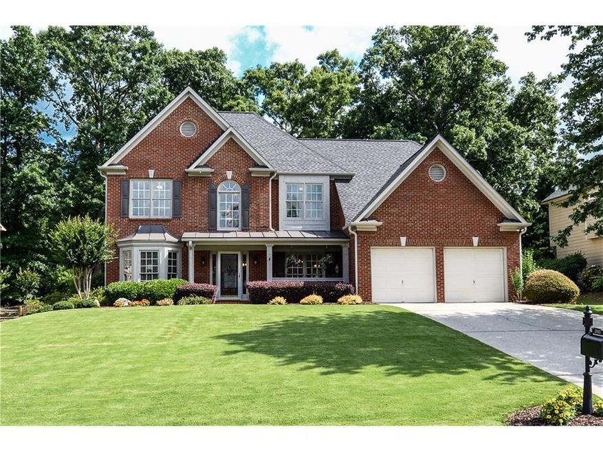 Welcome! Beautiful, brick front home with curb app