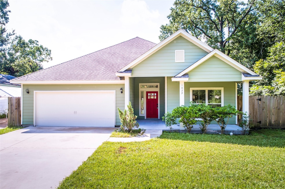 1029 Reverend b j Lewis Dr, Houston, TX 77088 - photo 1