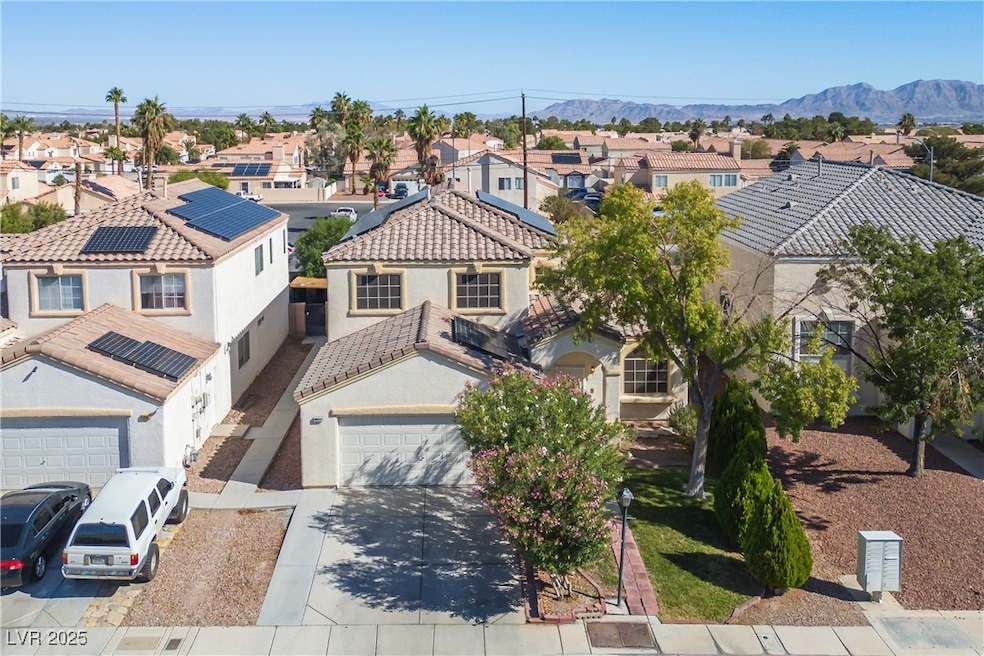 Aerial view of residential area with mountains