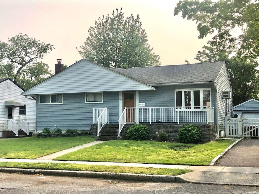 488 Arlington Dr, Seaford, NY 11783 - photo 1