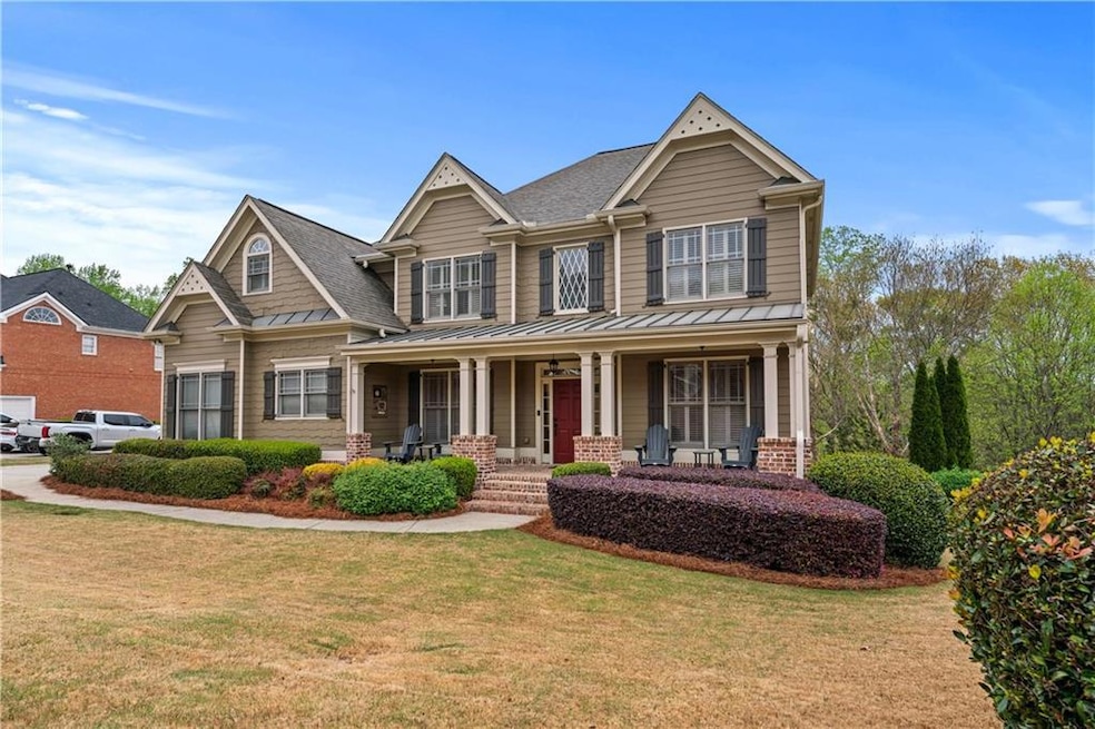 Craftsman inspired home with a front yard, a porch
