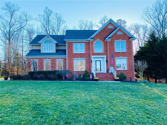 Meticulously-maintained 5 bedroom 4 1/2 bath brick