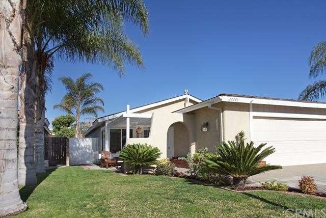Lovely updated home features a secluded entry and 