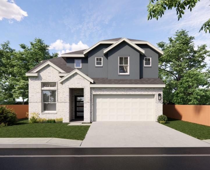 View of front of property with brick siding, driv