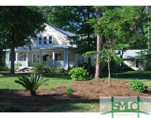 Exterior Front. Inviting drive to a place that fee