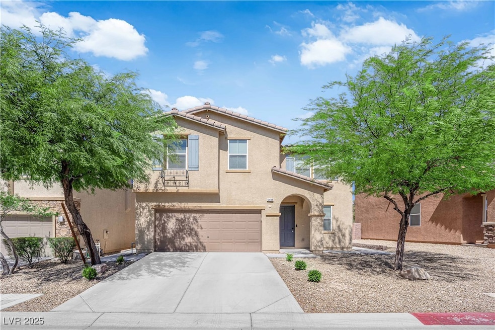View of front of property featuring stucco siding,
