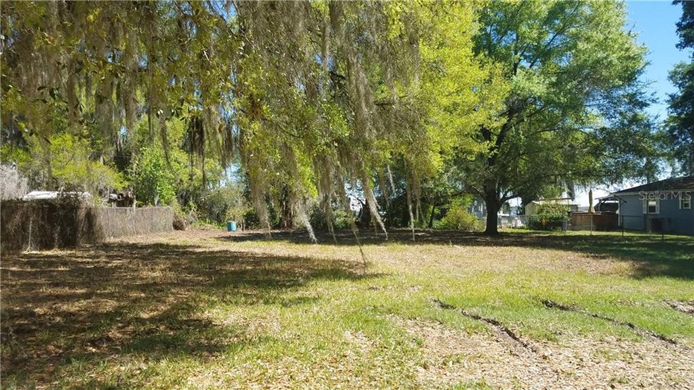 Standing on Kandy Lane looking to back of lot to Canal