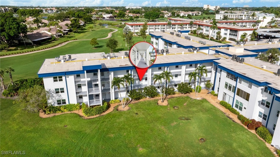 Drone / aerial view of a golf club and apartment c