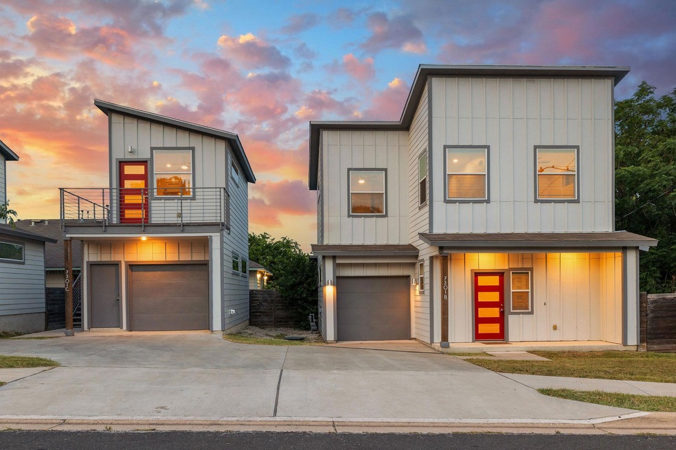 Contemporary home with a balcony, board and batte