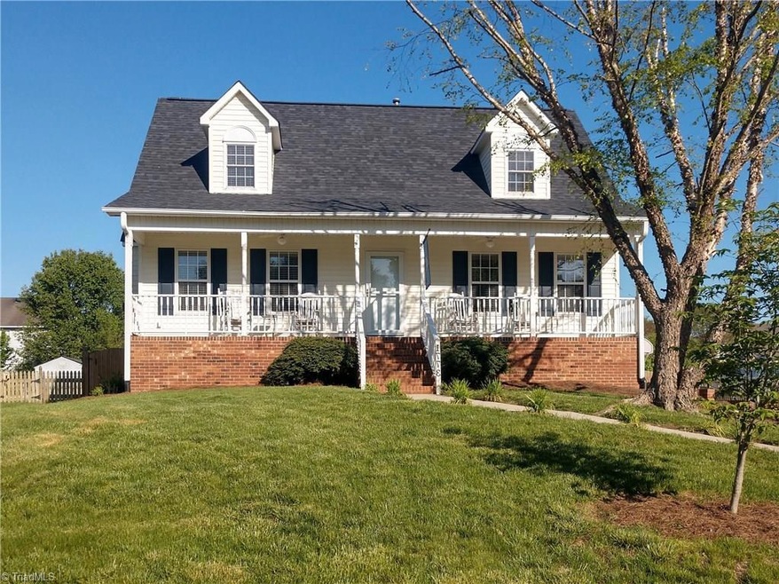 FRONT OF HOUSE,ON QUIET STREET.