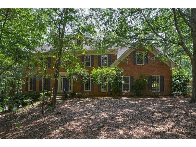 Stately Brick Traditional on a Beautiful Wooded Co