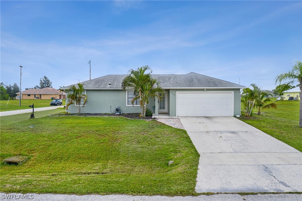 1723 NE 2nd Ave, Cape Coral, FL 33909 - photo 1