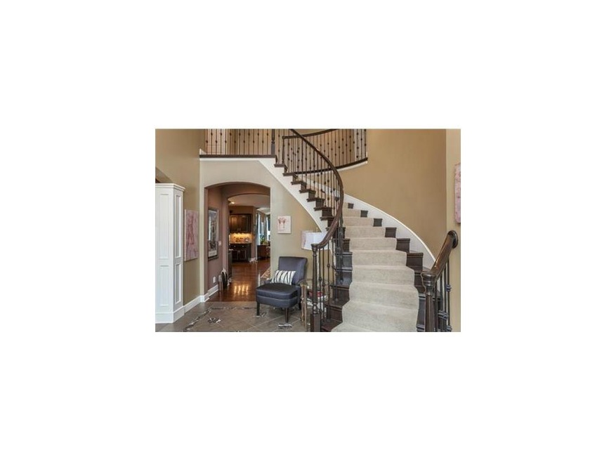 Elegant Entry with Beautiful, Natural Stone floor!