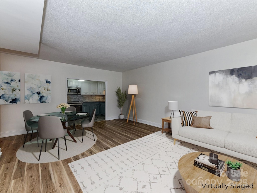 Virtually Staged Dining Area and Family Room