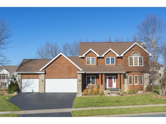 Welcome to this pristine Maple Grove home. Paver p