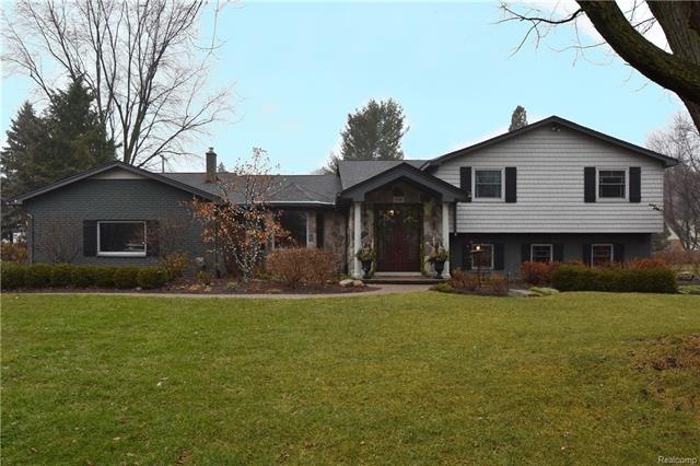 GREAT CURB APPEAL TO THIS CUSTOM RENOVATED HOME