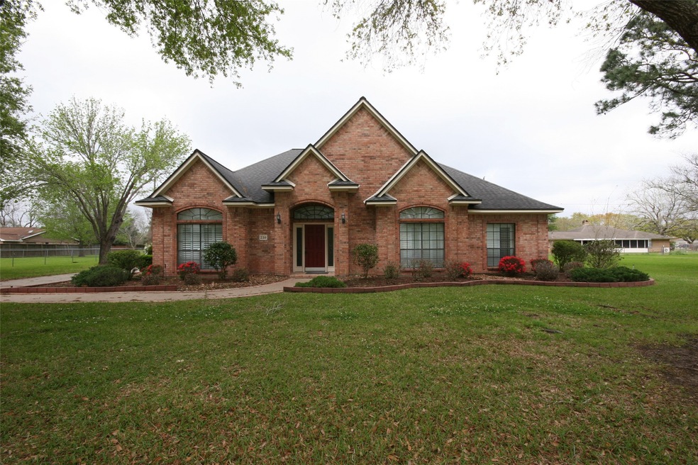 Custom Built Home situated on over 1/3 Acre Landscaped Lot