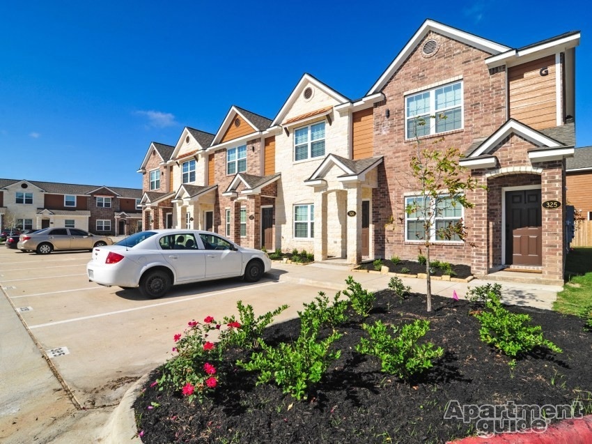 Multi unit property with brick siding, a residenti