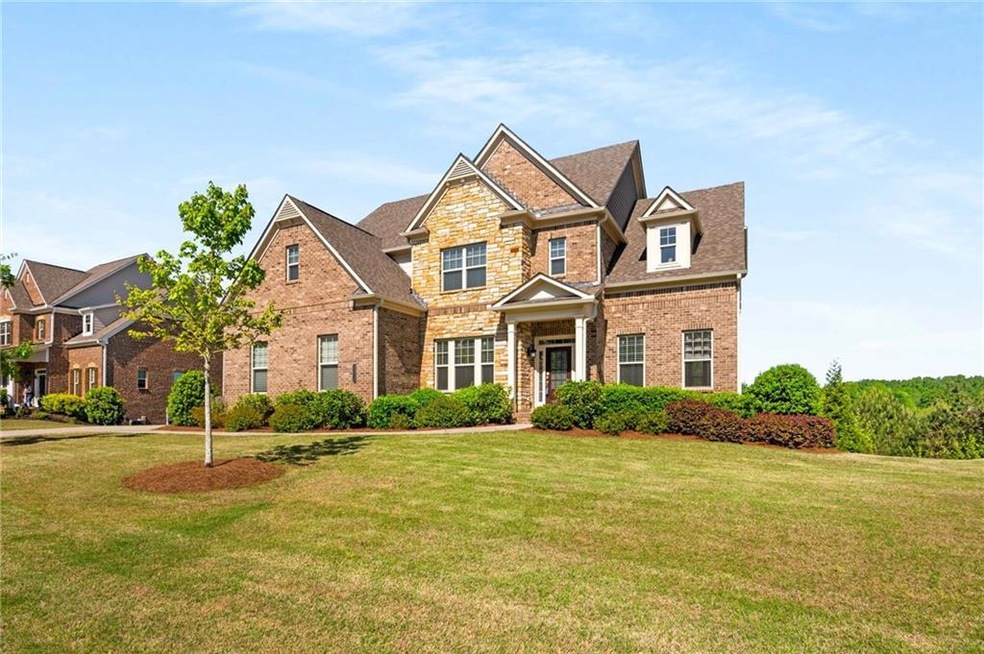 Craftsman-style home with a front lawn