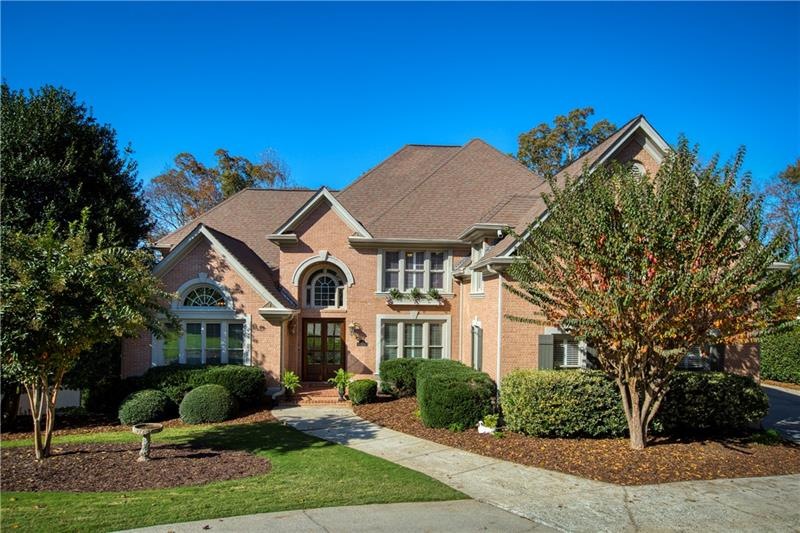 This warm and inviting brick traditional truly has