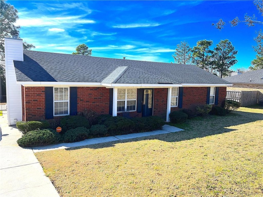 Single story home featuring a front yard