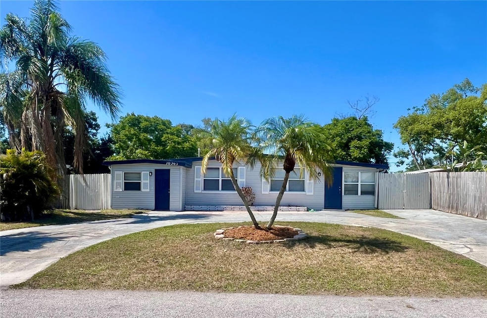 The circular driveway provides ample parking