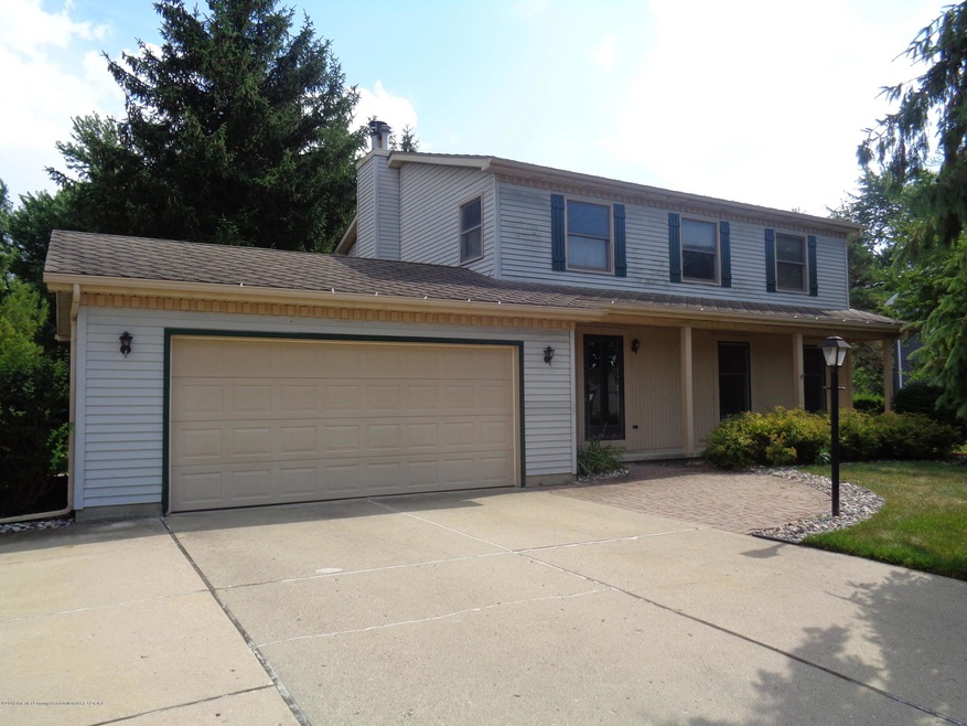 6525 W Millsborough Cir, Lansing, MI 48917 - photo 1