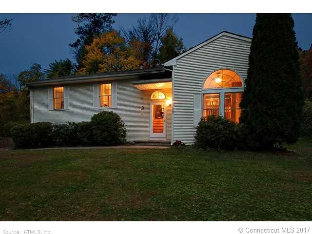 Exterior Front. Large windows inviting front yard