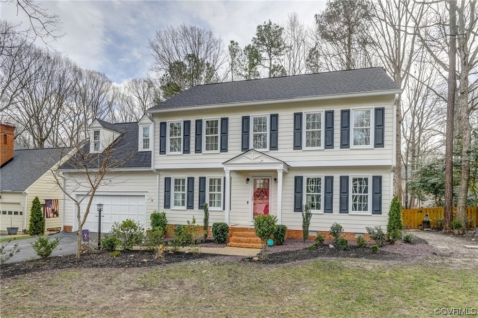 The Pretty White exterior with New Landscaping, Re