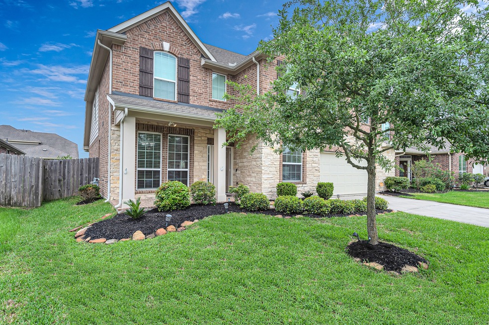 Arriving after a long day, you take a moment of peace as you admire your beautiful home.