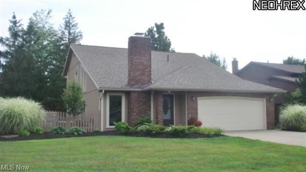 Welcome!  Great curb appeal with brick & cedar exterior.  Painted this summer.