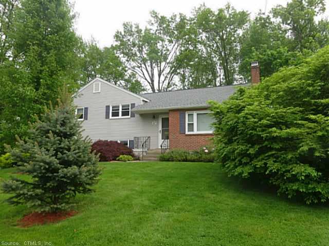 Exterior Front. Beautiful mature plantings around 