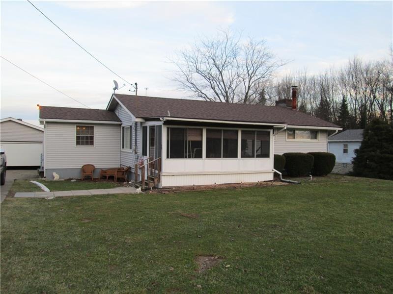 Exterior Front and Enclosed Porch