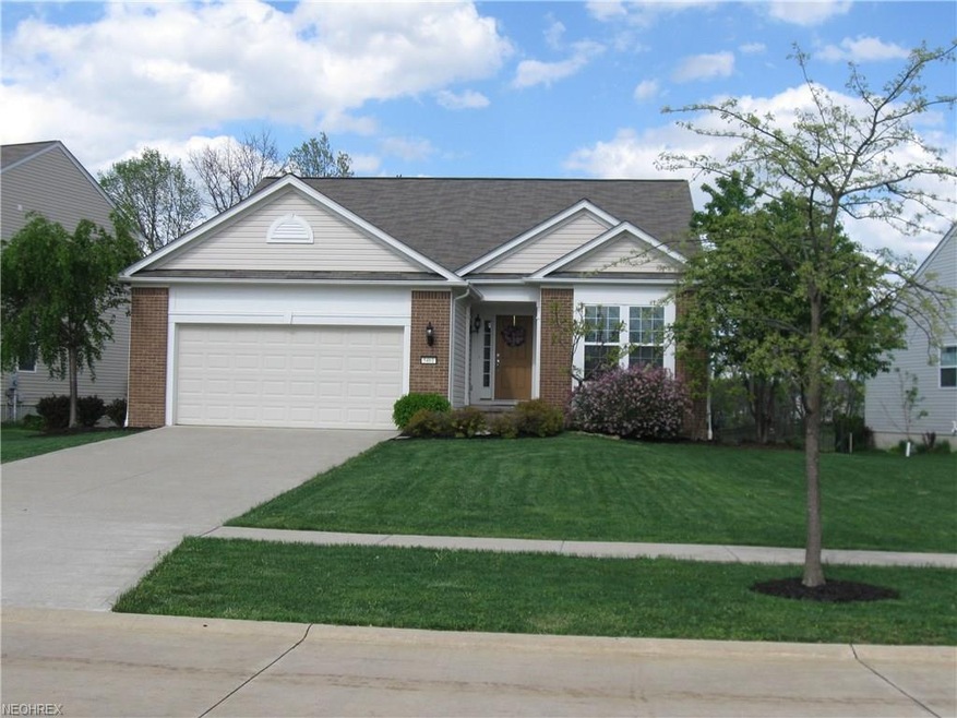 WELCOME to 5461 Royal Brook, a popular ranch-style home with full basement and partial brick front!