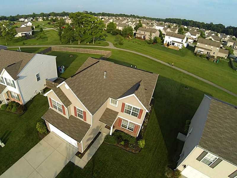 Aerial View. Backyard connects to common area, and walking trail.  Make the backyard feel extremely large, without the maintenance.