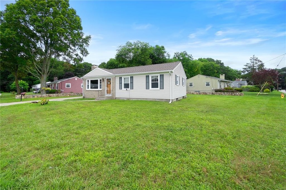 Large front and side yard, bordered by beautiful s