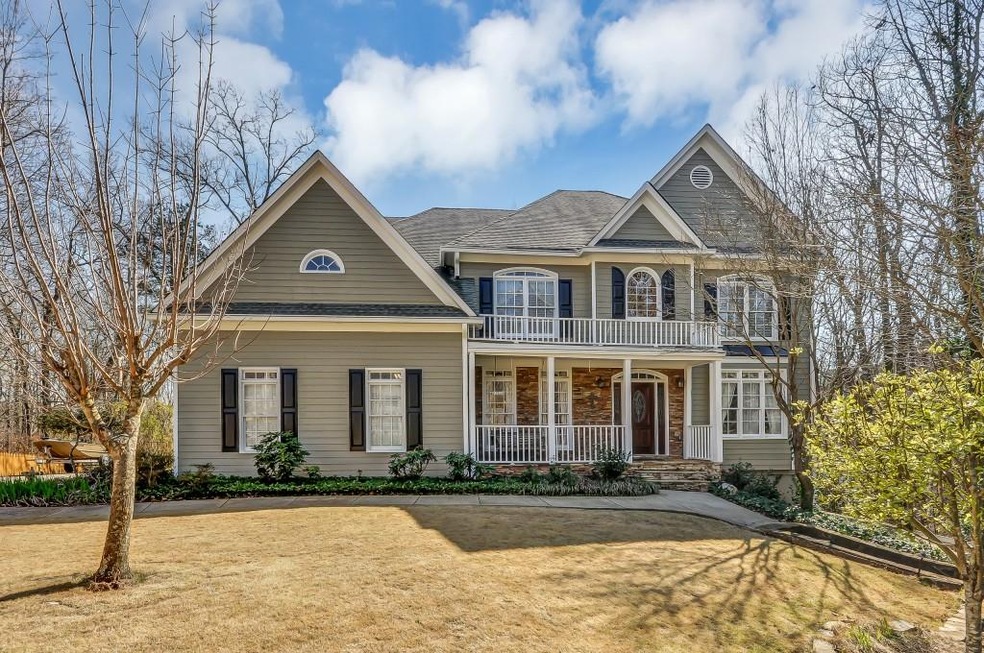 CHARMING FAMILY HOME THAT BACKS UP TO LAKE LANIER