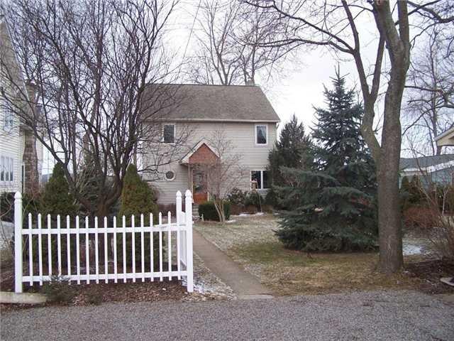 Exterior Front. Roadside front, Note-new tear off 