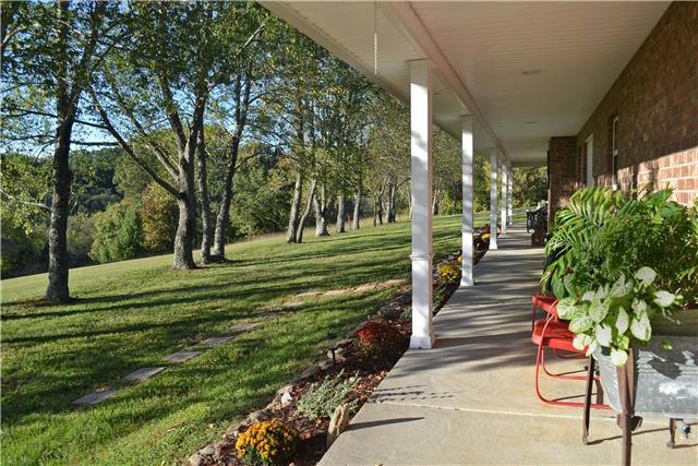 IT'S DOESN'T GET ANY BETTER THEN THIS! ENJOY THE SUNSETS FROM THIS BEAUTIFUL FRONT PORCH OVERLOOKING THE ROLLING HILLS! FABULOUS LOCATION TO EVERYTHING BUT LOCATED IN THE COUNTY! LOW TAXES! 