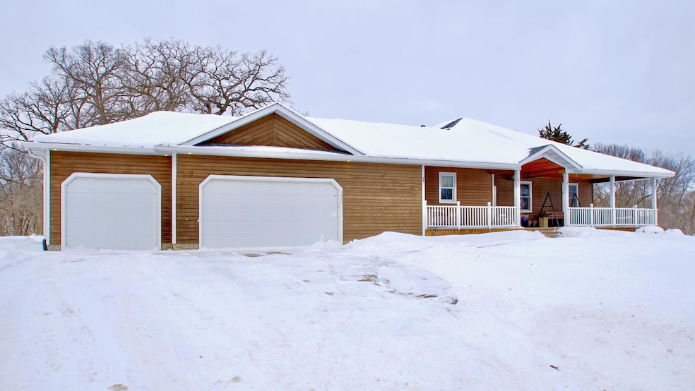 Front View - 3 Car Garage - Covered Front Porch