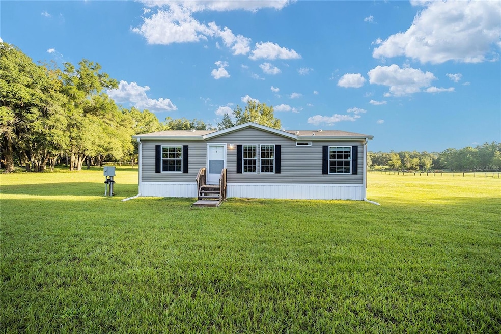 LOOK AT THIS BEAUTIFUL PROPERTY!!! 8.75 ACES WITH A NEWER MANUFACTURED HOME