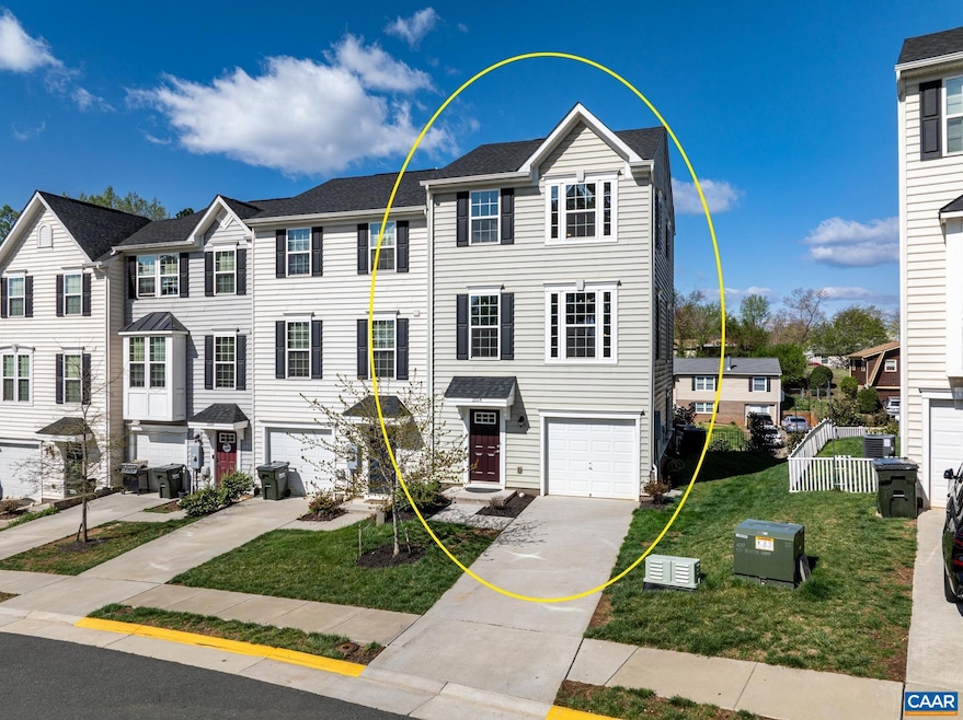 Welcome home to your charming end-unit townhouse! 
