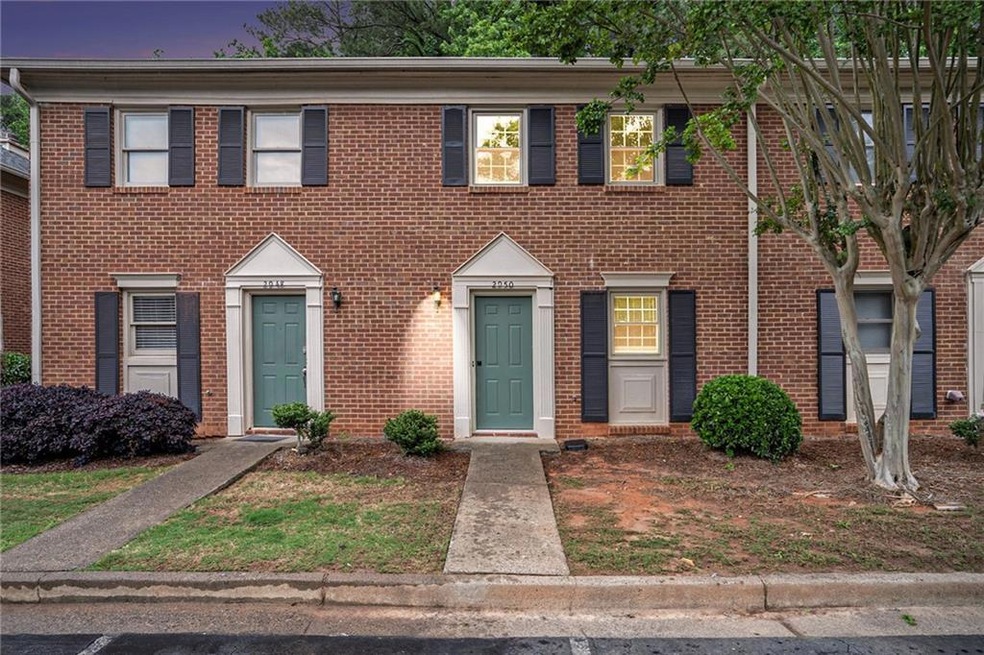 View of front of property with brick siding