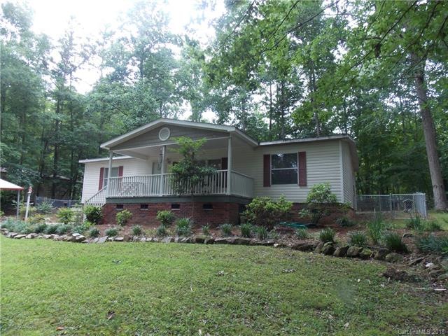 Beautifully Landscaped house set in the woods.