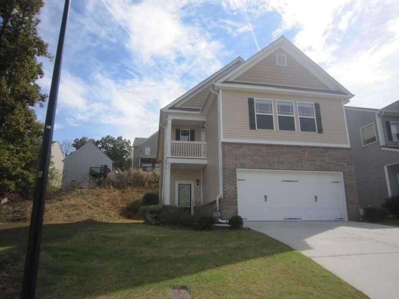Exterior Front. Brick accent 2 story home in move 