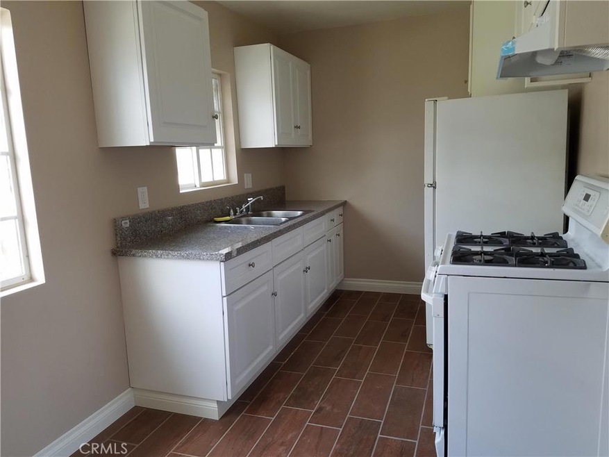 Granite slab & newer cabinets.