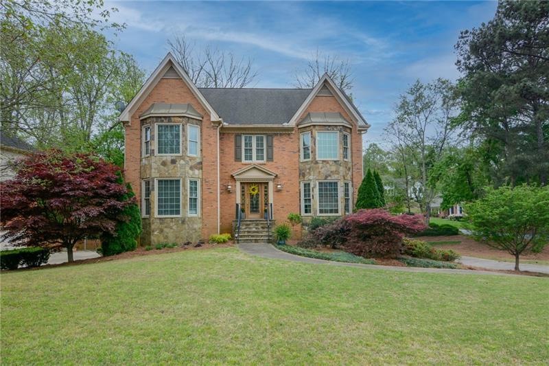This beautiful home is on a corner lot with a flat