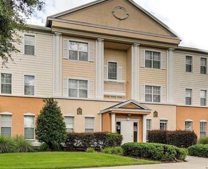 7689 Heritage Crossing Way unit 101, Reunion, FL 34747 - photo 1